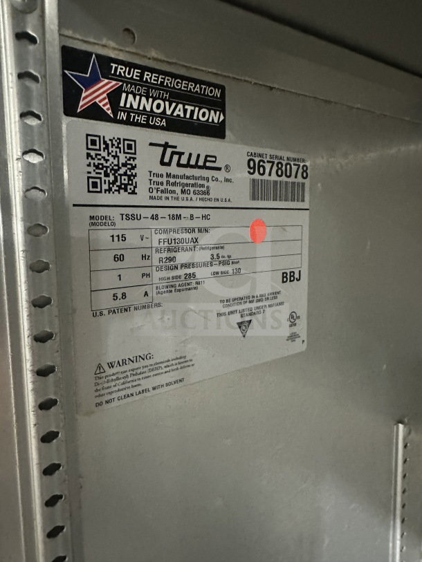 True TSSU-48-18M-B-HC refrigerated prep table, stainless steel, 2-door, poly-coated rack, on casters, SN: 9678078.