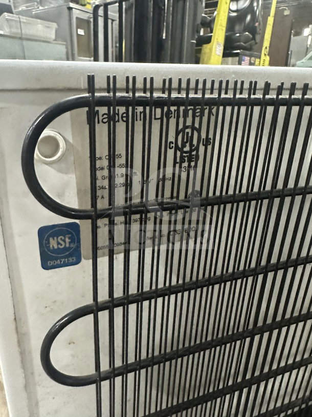 Commercial countertop single glass-door display cooler/freezer with poly coated wired rack, NSF certified, made in Denmark.