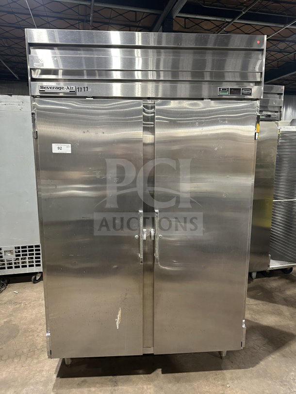 Beverage Air stainless steel 2-door reach-in refrigerator with poly-coated wire racks, on legs, slight surface wear.