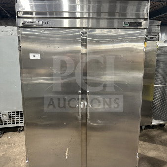 Beverage Air stainless steel 2-door reach-in refrigerator with poly-coated wire racks, on legs, slight surface wear.