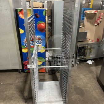 Commercial heavy-duty stainless steel bun pan rack on casters, showing multiple welded slots, item label "93" visible.