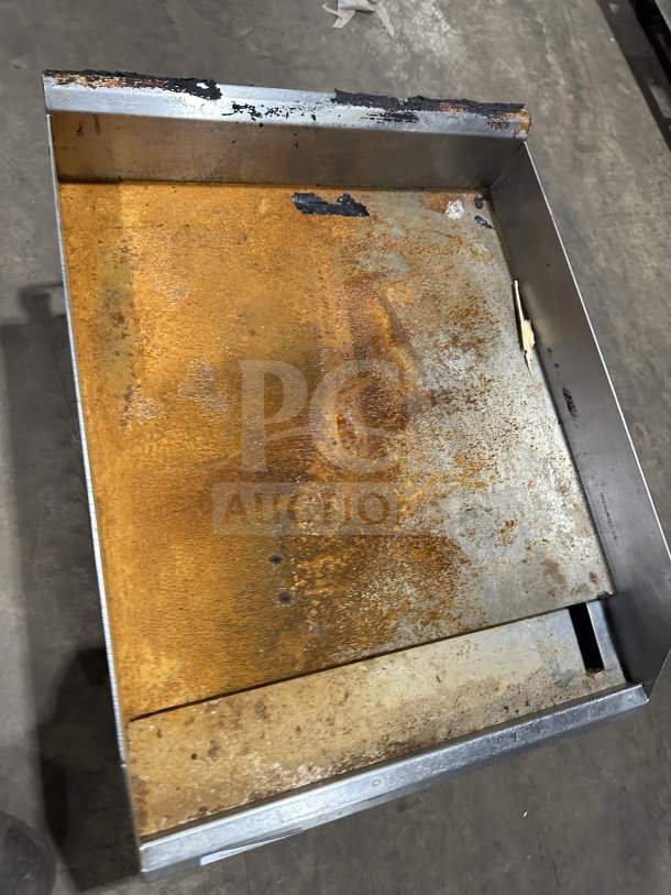 Southbend commercial stainless steel natural gas countertop flat griddle, with back and side splash, signs of heavy use and rust.