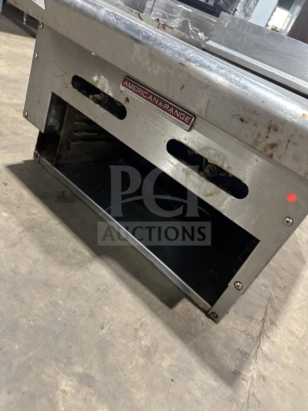 American Range commercial stainless steel natural gas countertop flat griddle with back and side splash, used condition.