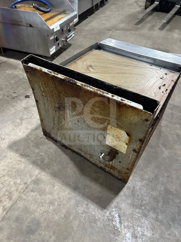 American Range stainless steel natural gas countertop flat griddle with back and side splash, used condition.