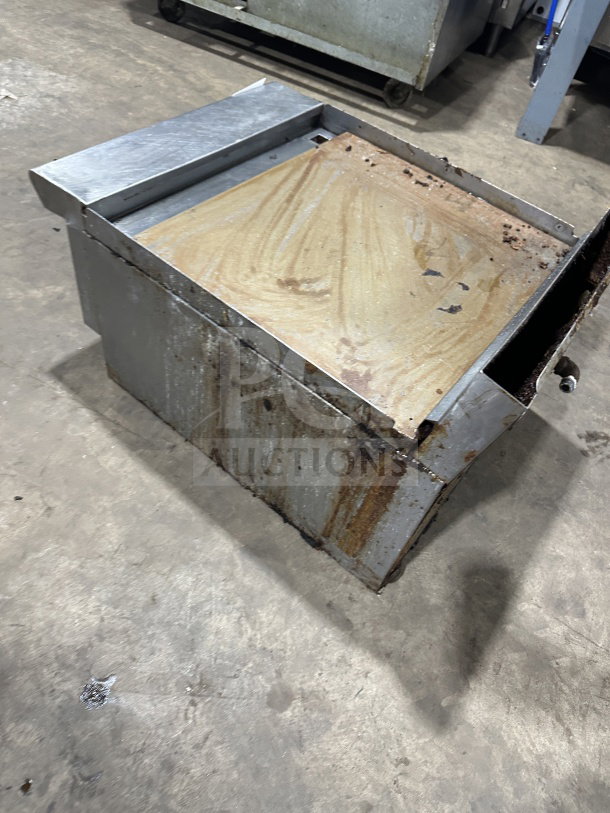 American Range stainless steel gas countertop griddle with back and side splash, used condition, visible wear.
