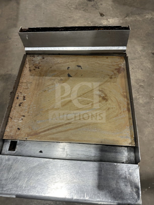 American Range stainless steel natural gas countertop flat griddle, back and side splash, used condition.