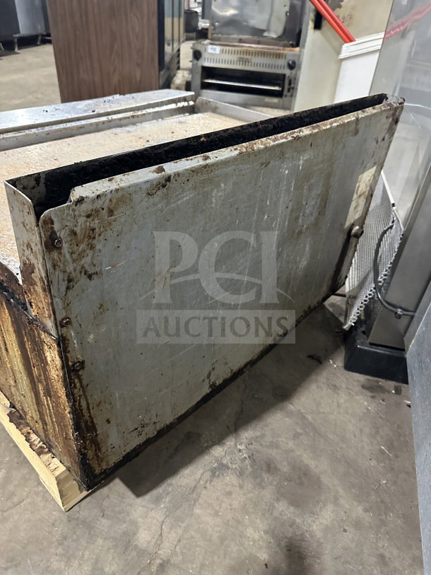 American Range commercial stainless steel natural gas countertop flat griddle with back and side splash, used condition.