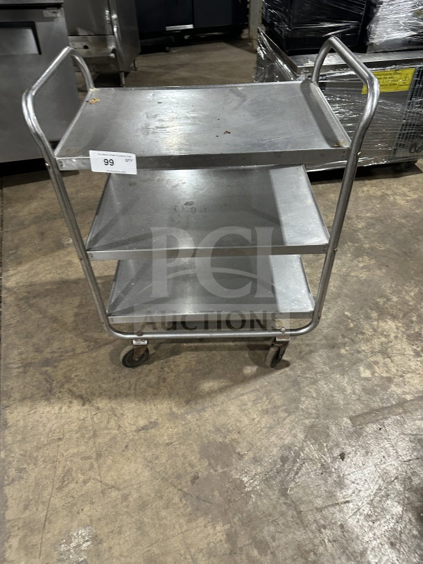 Commercial stainless steel 3-shelf utility cart on wheels, good condition, sturdy metal frame, labeled as "99."