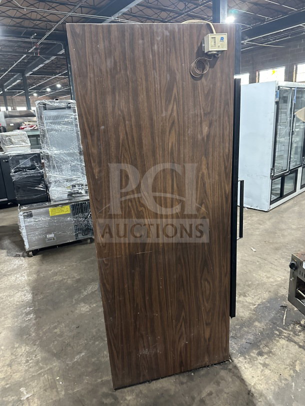 Beverage Air MT72 3-door merchandiser refrigerator/freezer, glass doors, poly-coated racks, woodgrain exterior, SN: 2615804.
