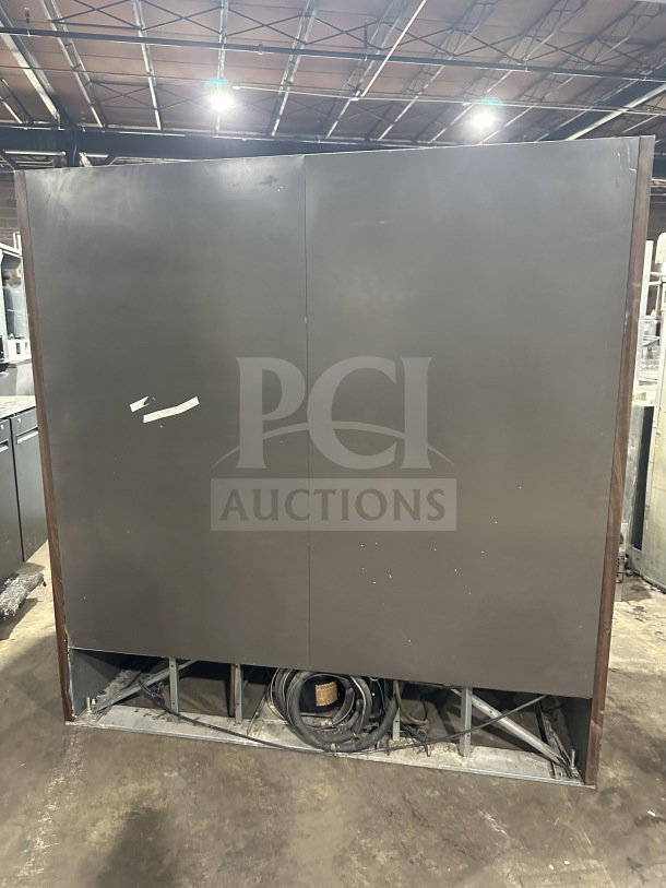 Beverage Air MT72 3-door reach-in merchandiser refrigerator/freezer. Features poly-coated wire racks. Condition: good. 115V, 1 phase. SN: 2615804.