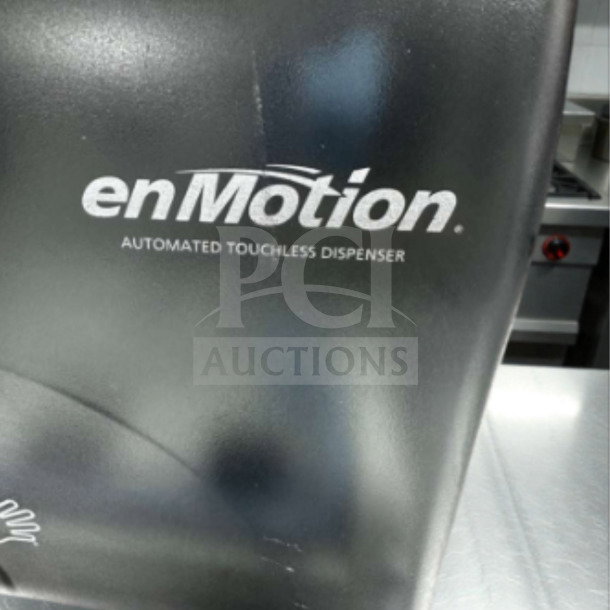 Georgia-Pacific enMotion 59462A touchless towel dispenser, black, top-tier condition, inspected and ready for use.