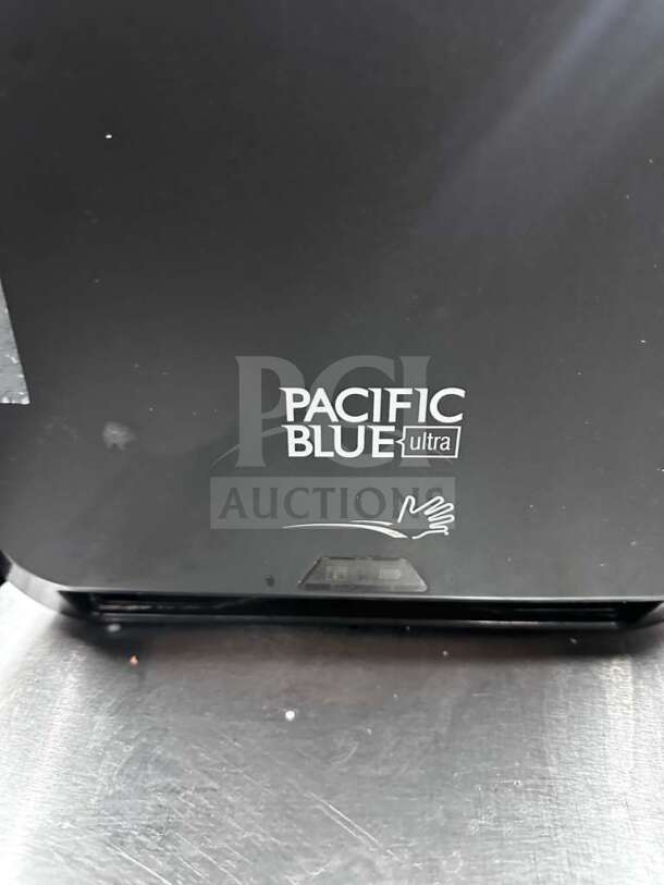 GP PRO Pacific Blue Ultra 59590 touchless paper towel dispenser, black, like-new, open box, logo visible. Quantity: 2.