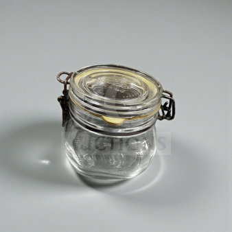 Pristine Bormioli Rocco Fido 0.5L glass jar with airtight clamp lid, made in Italy. Embossed markings visible.