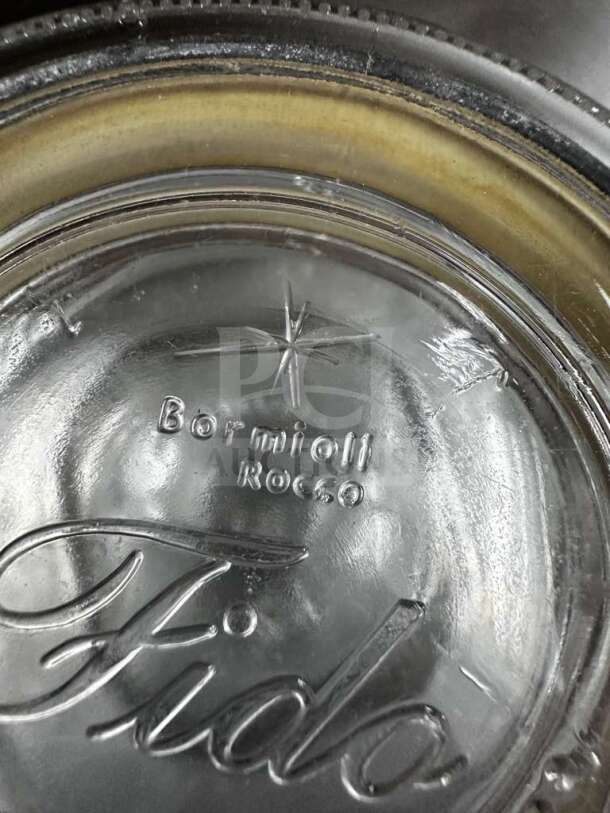 Bormioli Rocco Fido 0.5L glass jar lid, embossed with brand name. Pristine condition, airtight clamp lid.