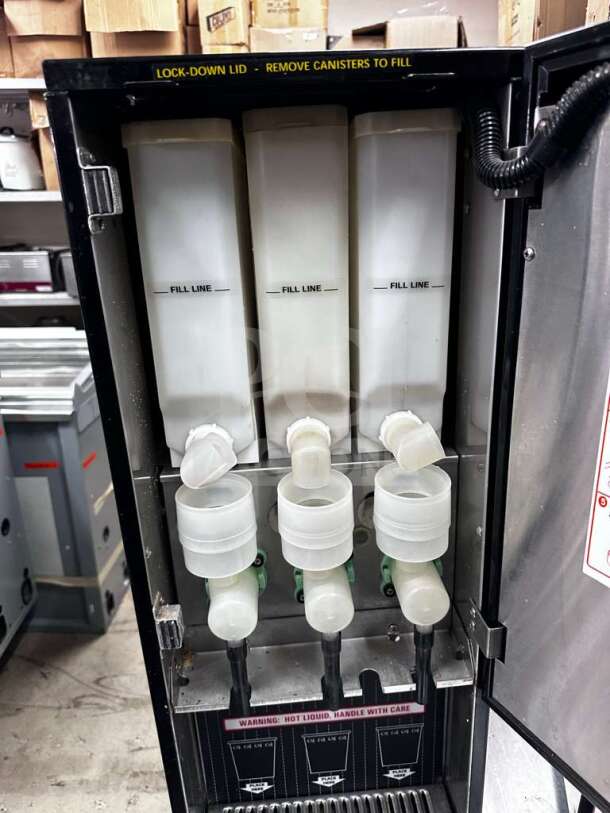 Wilbur Curtis PC-3D-10-01 cappuccino dispenser, 3 flavor stations, exceptional condition, fully tested operational, 120V.