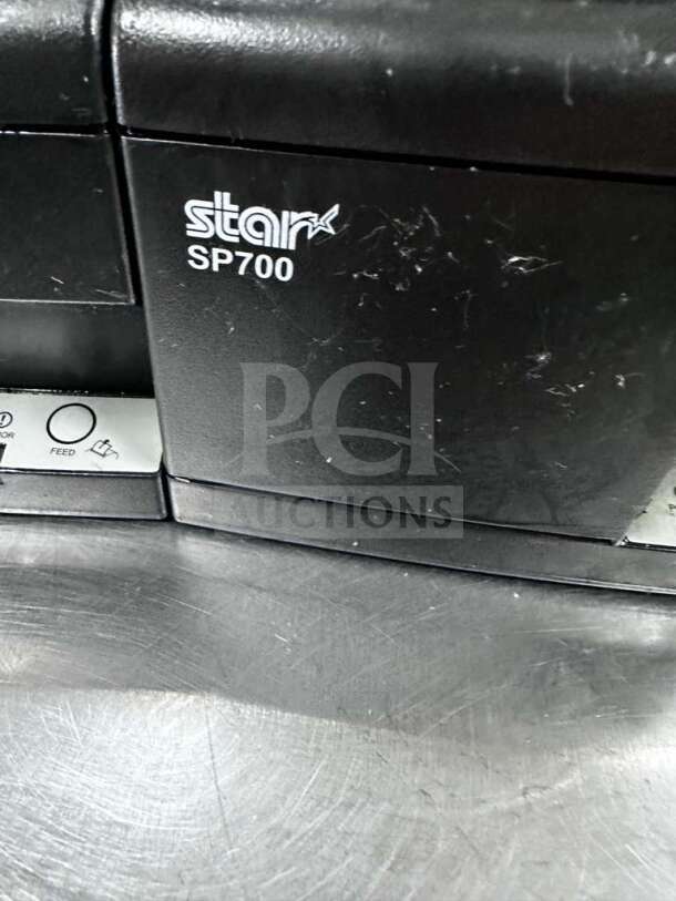 Star Micronics SP700 impact kitchen receipt printer, black, model SP742, fully tested and operational, slight surface marks.