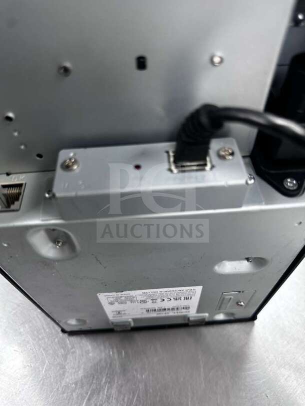 Star Micronics SP700/SP742 receipt printer, prime condition, 100-240V, fully tested. Visible label indicates model and compliance information.