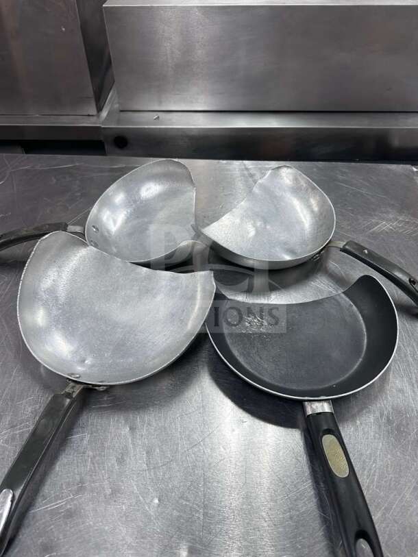 Oster nonstick wok and stir-fry pan set, quantity 4, well-maintained condition, inspected, commercial kitchen cookware.