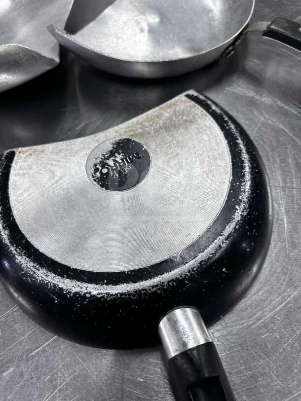 Oster nonstick wok set, four pans, well-maintained, commercial kitchen quality, inspected, model OST-S-PAN-1095.