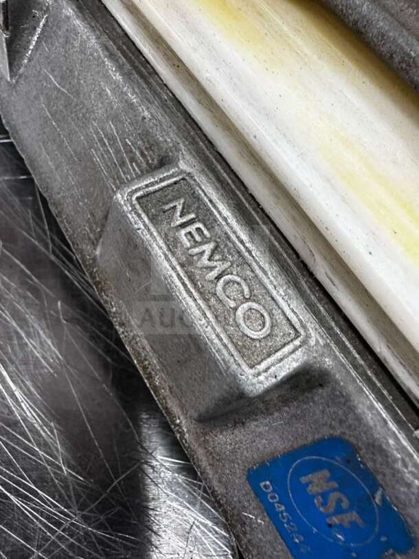 Nemco 55600-2 Commercial Tomato Slicer, high-grade, 1/4" cut, NSF listed, durable gray metal with visible logo and markings.