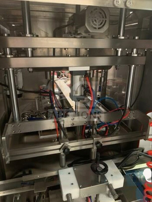 TANG Two-Head Automatic Filling Machine for sauces and liquids, premium condition, fully tested, model TAN-L-FIL-0423.
