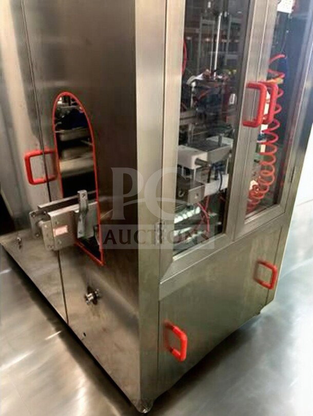Tang Machinery four-station semi-automatic vacuum capping machine in premium condition, red handles, stainless steel finish.
