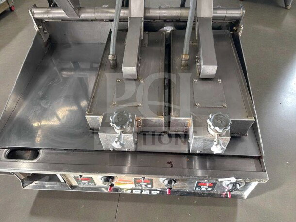 Keating Miraclean® 36" gas griddle, exceptional condition, UL & NSF listed, fully operational, stainless steel with control knobs.