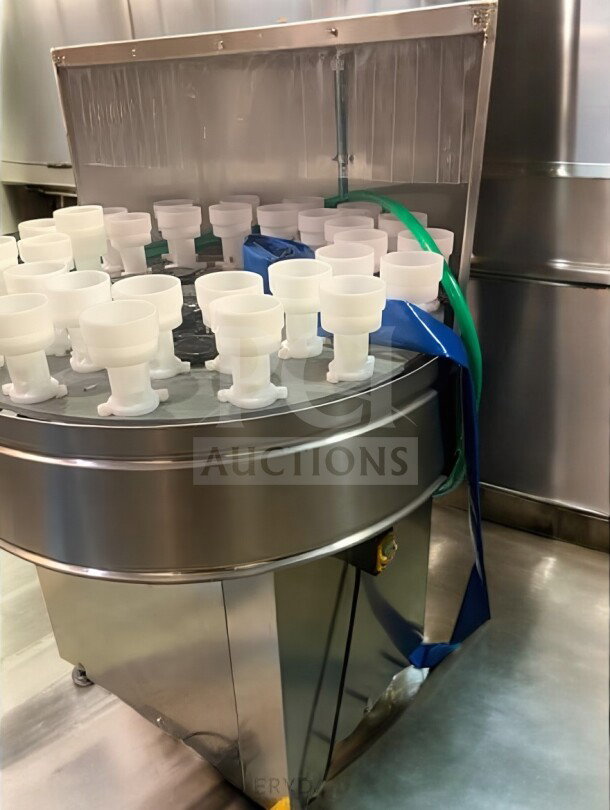 Superb condition Tang Rotary Round Bottle Washer, automatic inner/outer rinse, model TNG-L-WASH-0420, fully tested.