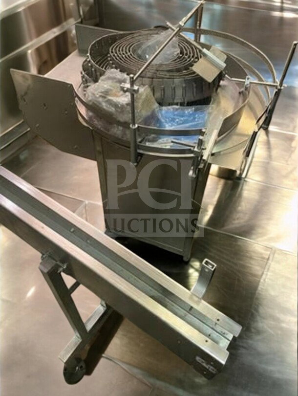Tang Rotary Round Bottle Washer in superb condition, automatic rinse feature, model TNG-L-WASH-0420, fully tested.