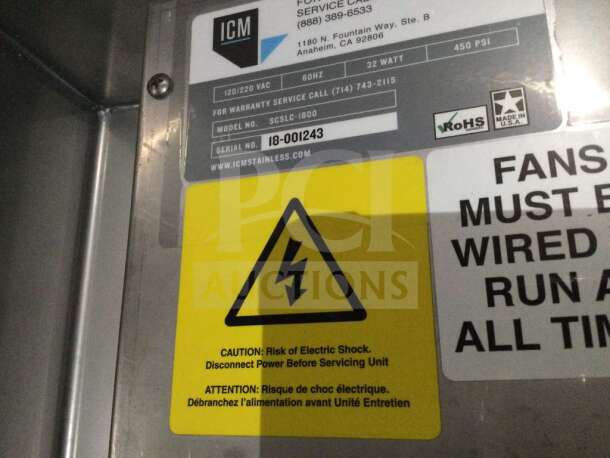 ICM Stainless SCSLC-1800 commercial refrigerated unit label, model and serial number visible, 120/220V, warning signs present.