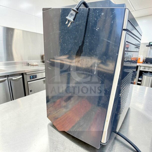 Euro-Gold W-995 undercounter refrigerator, black, compact design, 115V, fully tested, light wear marks visible.
