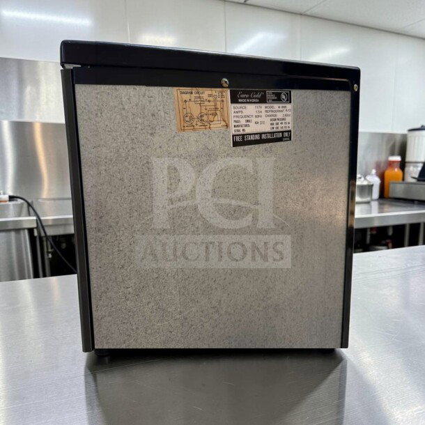 Euro-Gold W-995 undercounter refrigerator in high-quality condition, space-saving design, 115V. Visible labels detail specifications.