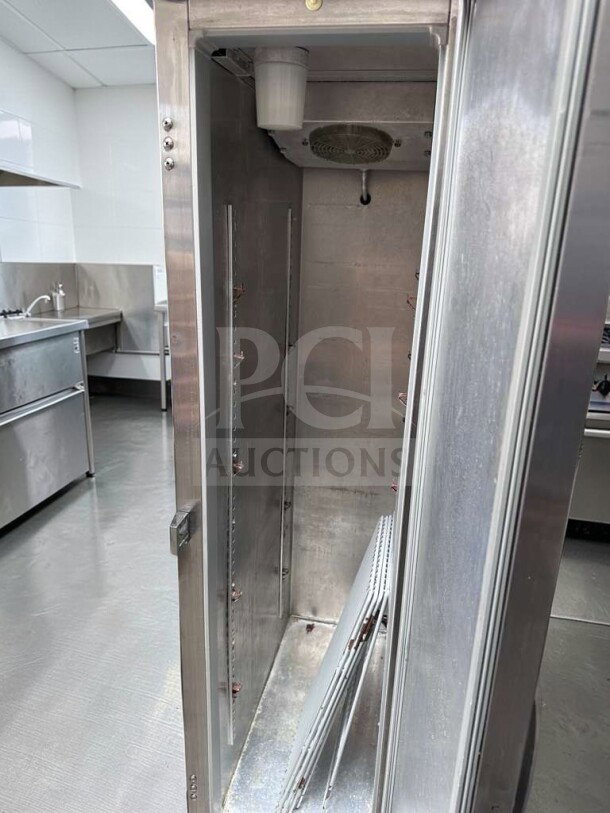 Continental 1RSE-N stainless steel refrigerator, 18" narrow reach-in, one section, interior view, fully tested, in superior condition.