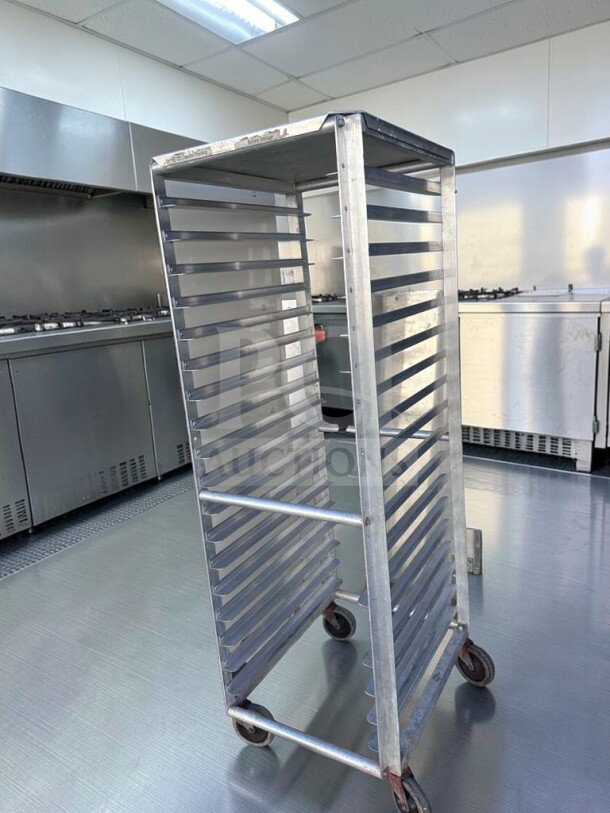 Commercial aluminum full-size sheet pan rack, 20 pan capacity. Heavy-duty with casters, model ALU-M-RCK-0575. Premium condition.