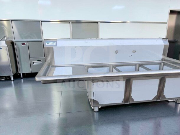 Brand new KoolMore SC121610-16L3 stainless steel 3 compartment sink with left drainboard, NSF certified, in commercial kitchen.