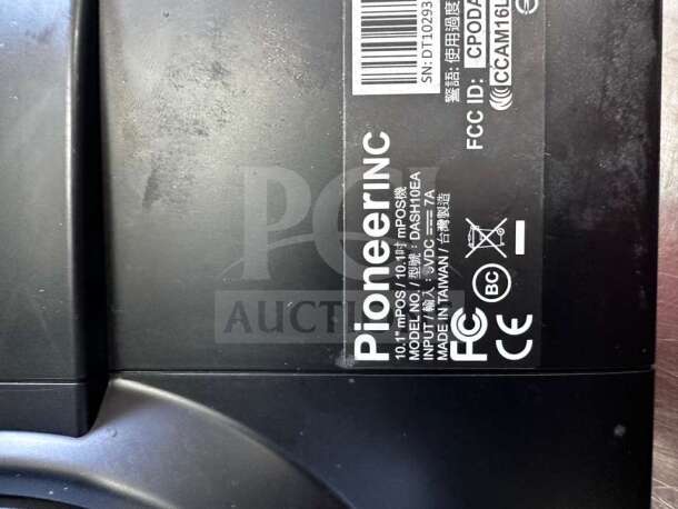 Pioneering DASH10EA 10.1" touch screen tablet POS system in exceptional condition. Label shows model and FCC details.