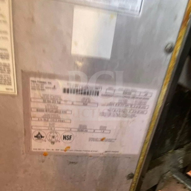 Close-up of Pitco SSH55 commercial gas fryer label, showing model, NSF certification, and specifications for auction item.