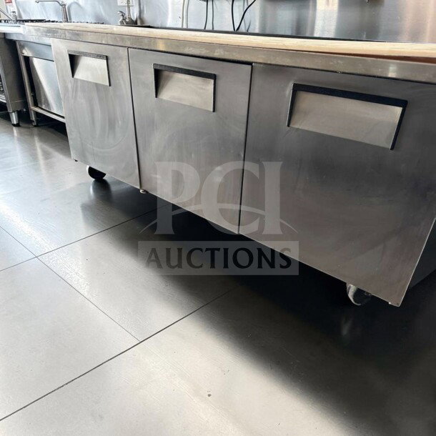 True TSSU-72-30M-B-ST-HC 72” Mega Top Sandwich Prep Table in excellent condition, stainless steel base, refrigerated, 115V.