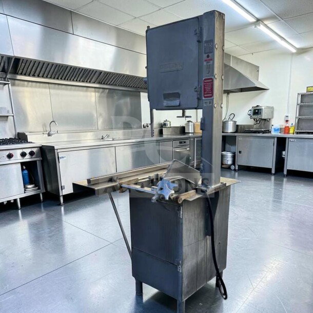 Hobart 5614 commercial meat saw, 2 HP, 3-phase, for parts or repair. Heavy-duty condition, model marked on saw.