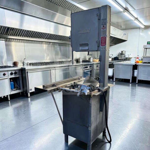 Hobart 5614 Commercial Meat Saw, 2 HP, 3 Phase, heavy-duty condition shown in a commercial kitchen setting. For parts or repair.