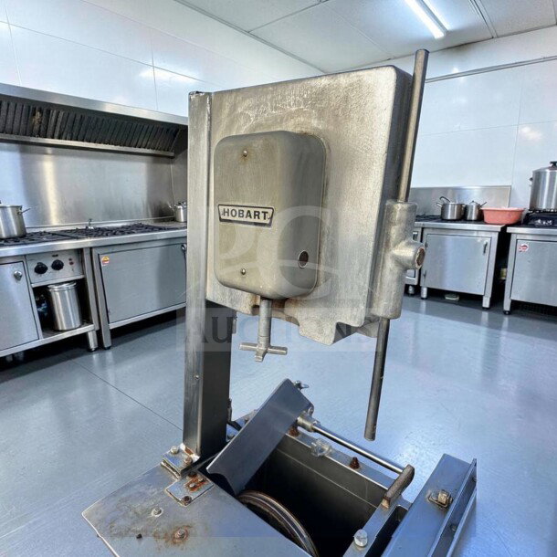 Hobart 5614 commercial meat saw, heavy-duty, 2 HP, 3 phase, for parts or repair, visible Hobart logo on the front panel.