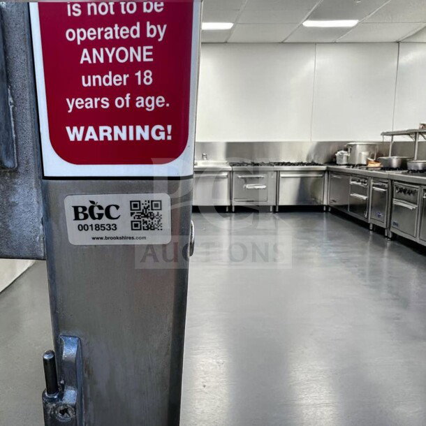Hobart 5614 commercial meat saw, 2 HP, 3-phase, heavy-duty, for parts or repair, warning label and BGC ID visible.