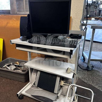 Dell multi-component computer workstation system including monitor, speakers, printer, and audio interface, fully operational.