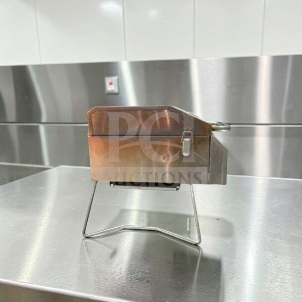 Nexgrill 2-burner portable gas grill, model 820-0033. Stainless steel, compact design, excellent condition, fully operational.