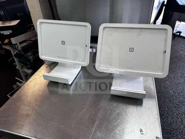 Square Stand S089 POS System Lot; dual tablet stands, white, fully tested, operational, with cables; marked with Square logo.
