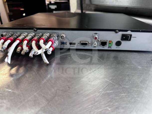 Hikvision DS-7216HQI-K2 16-Channel TurboHD DVR; elite condition, fully operational. Back view with connected cables and ports.
