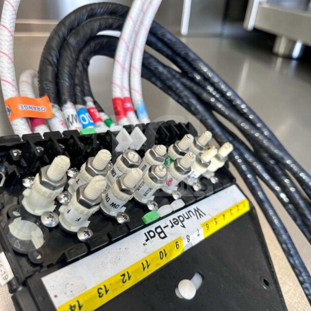Close-up of Advance Tabco SLI-12-36-7 underbar ice bin connections, labeled hoses, and Wunder-Bar branding, in excellent condition.
