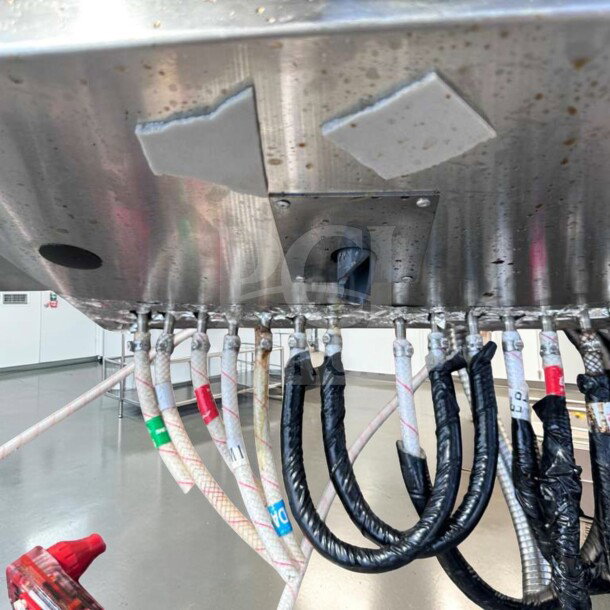 Advance Tabco SLI-12-36-7 underbar ice bin with 7 circuit cold plate, stainless steel, in superior condition, showing connected pipes and fittings.