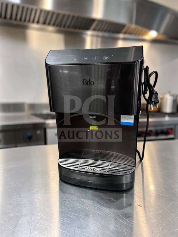 Brio Moderna CLCTPOU720UVF3B countertop water cooler, black stainless, outstanding condition, UV care label visible.
