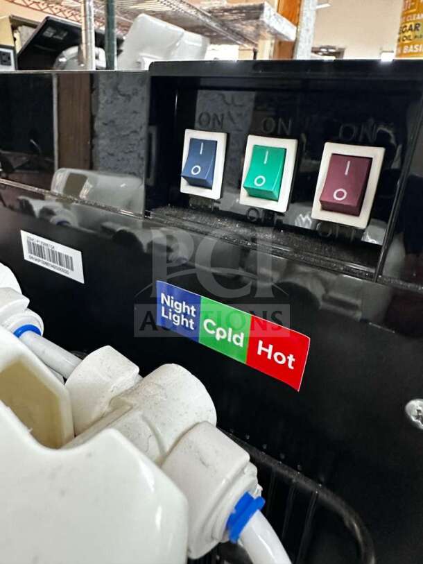 Brio Moderna CLCTPOU720UVF3B water cooler controls and labels, showcasing Night Light, Cold, and Hot settings.